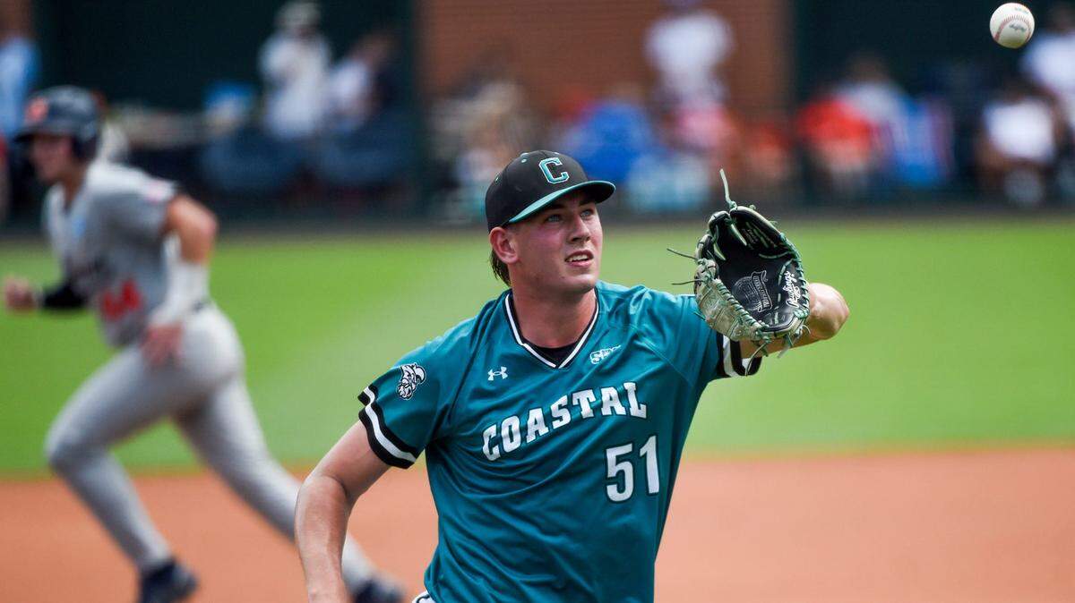 Coastal Carolina pitcher Jacob Morrison (51) catches a ball hit by Auburn during game two of the NCAA Baseball Super Regional at Plainsman Park in Auburn, Ala., on Friday June 6, 2025.