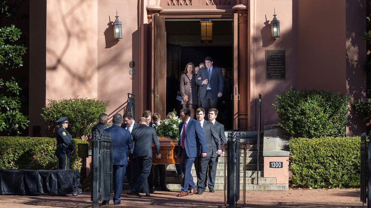 Joe E. Taylor’s family members watch as pallbearers carry the casket out of First Presbyterian Church in downtown Columbia after the funeral of Joe E. Taylor on Thursday, Jan. 5, 2023.