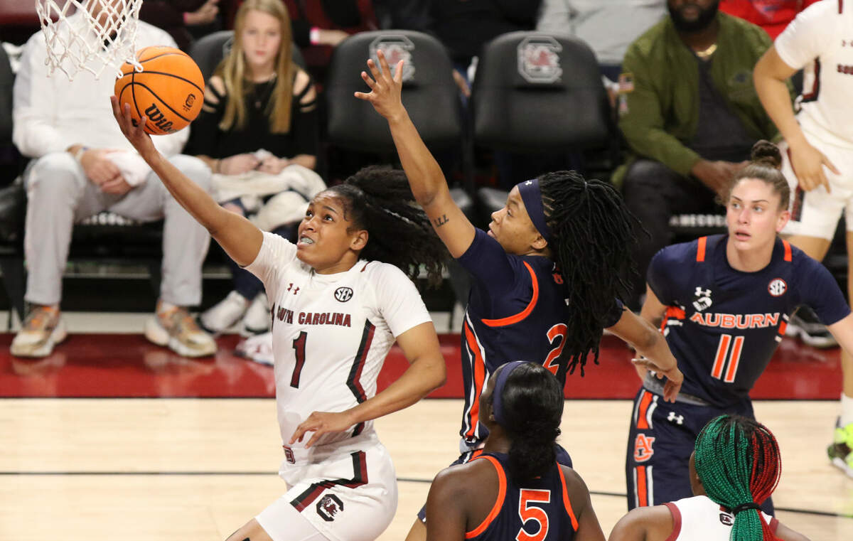 South Carolina’s Zia Cooke (1) shoots as Auburn’s Santa Wells (2) pressures during the first half of action in the Colonial Life Arena on Thursday, Dec. 5, 2023.
