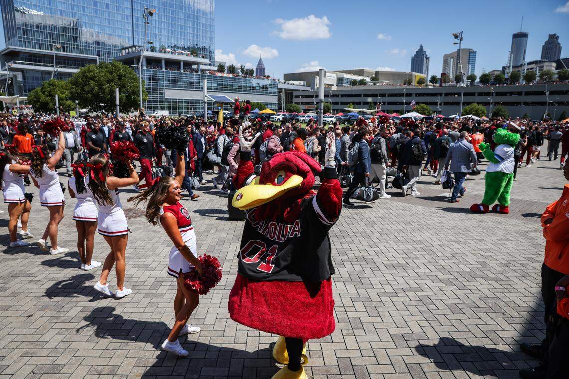Cocky and cheerleaders hype up the crowd during the Gamecock Walk on Sunday at Mercedes-Benz Stadium in Atlanta. The Gamecocks and Hokies faced off Aug. 31 in the 2025 Aflac Kickoff Game.