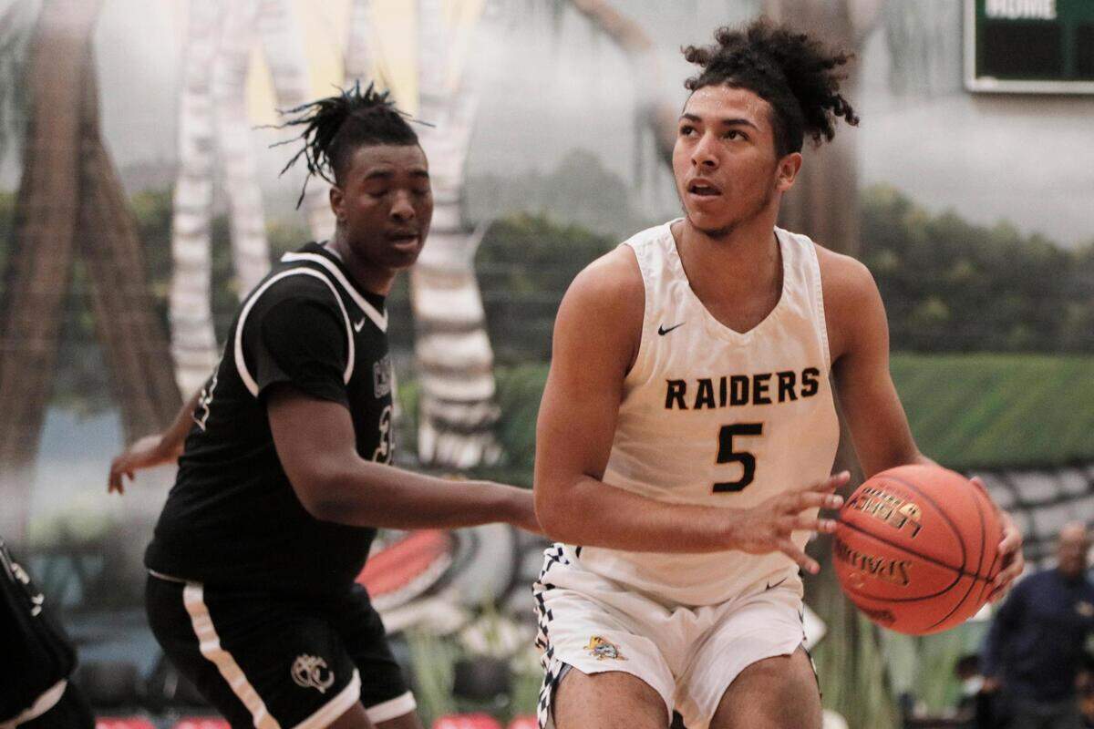 Keenan’s Semajeh Echols 5 plays Carmel in the Chick-Fil-A Classic at River Bluff High School on Wednesday, December 29, 2021.