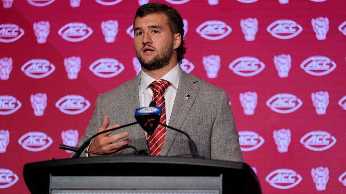 Jul 25, 2024; Charlotte, NC, USA; North Carolina State Wolfpack quarterback Grayson McCall speaks to the media during the ACC Kickoff at Hilton Charlotte Uptown.