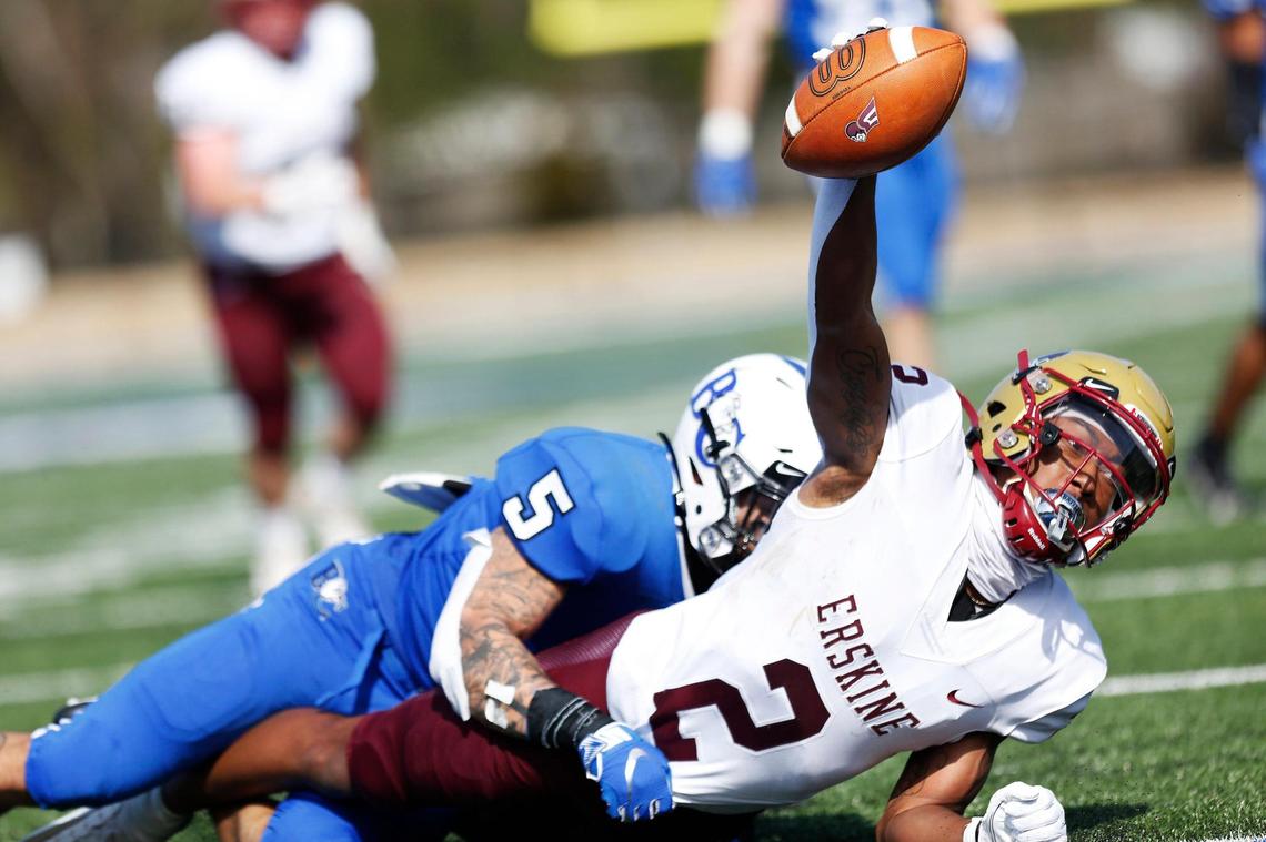 Erskine receiver Javian Bellamy (2) scores a touchdown as he’s tackled by Barton Bulldogs defensive back Jordan White (5) in the first quarter of the game Saturday.