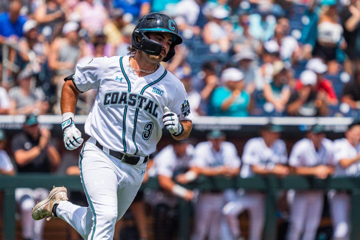 Coastal Carolina Chanticleers shortstop Ty Dooley (3) runs after hitting a single against the Arizona Wildcats during the fourth inning at Charles Schwab Field.