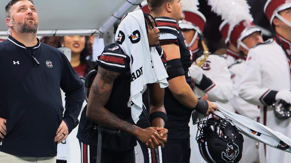 South Carolina defensive back Judge Collier (8) stands with the help of crutches during the 2025 Aflac Kickoff Game Mercedes-Benz Stadium in Atlanta, Georgia on Sunday, August 31, 2025.