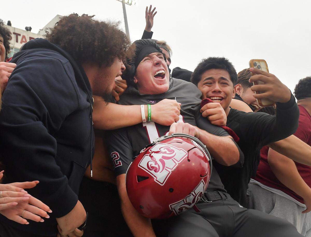 Westside High Cutter Woods (12) reacts to the win over South Florence in the 2023 Class 4A football state championship game.