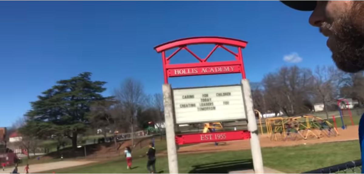 The video on YouTube shows Thompson outside Hollis Academy in Greenville, South Carolina.