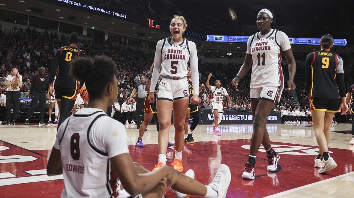 South Carolina's Tessa Johnson (5) and Madina Okot (11) react to a play by Joyce Edwards (8) during the second half of action of their women's basketball game against University of Southern California in the second round game of the NCAA Tournament at Colonial Life Arena on Monday, March 23, 2026.