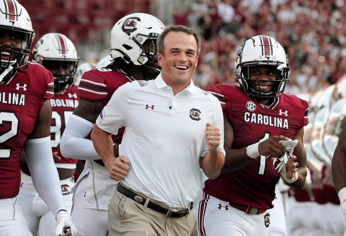 South Carolina Gamecocks head coach Shane Beamer runs with his team before they play the Eastern Illinois Panthers at Williams-Brice Stadium on Saturday, September 4, 2021.