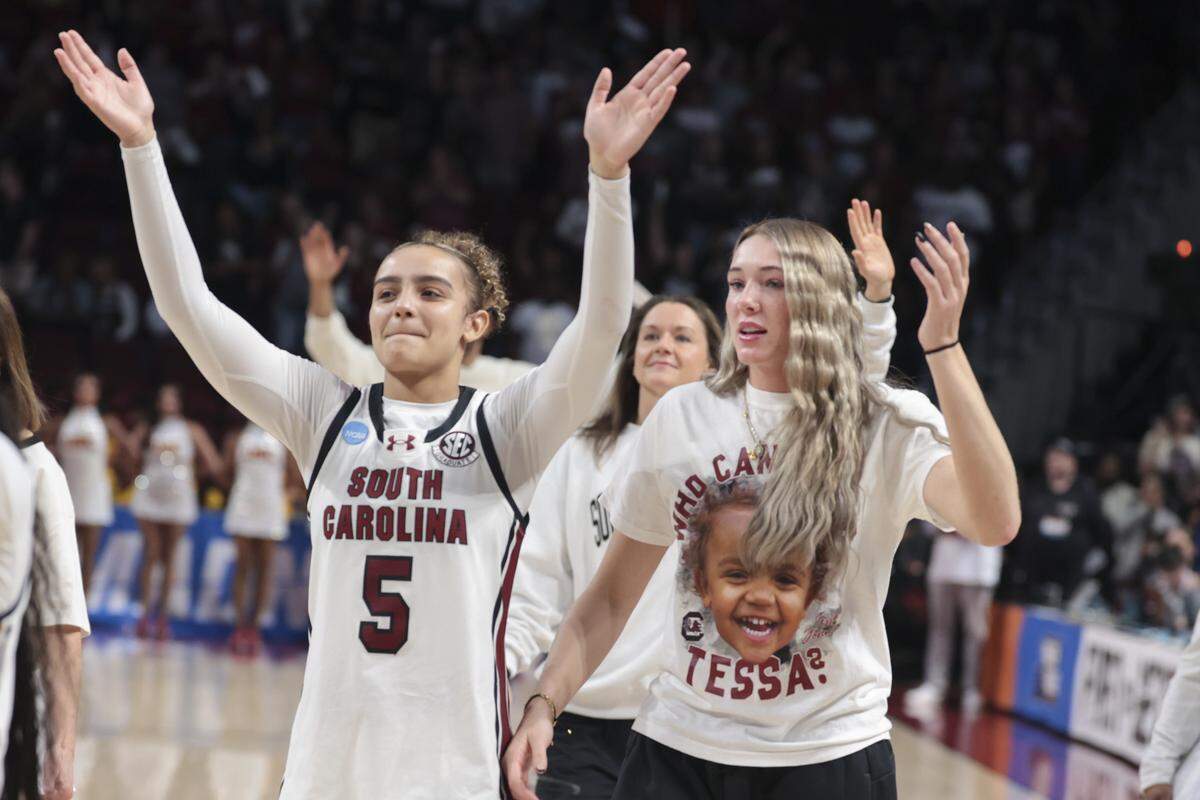 Tessa Johnson and Chloe Kitts make their way around Colonial Life Arena, waving to the fans after playing the last home game of their season on Monday, March 23, 2026.