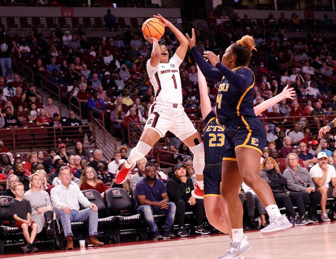 South Carolina’s Zia Cooke (1) shoots as East Tennessee State’s Sarah Thompson (23) and Meleah Kirtner (4) defend in the Carolina Coliseum on Monday, Nov. 07, 2022.