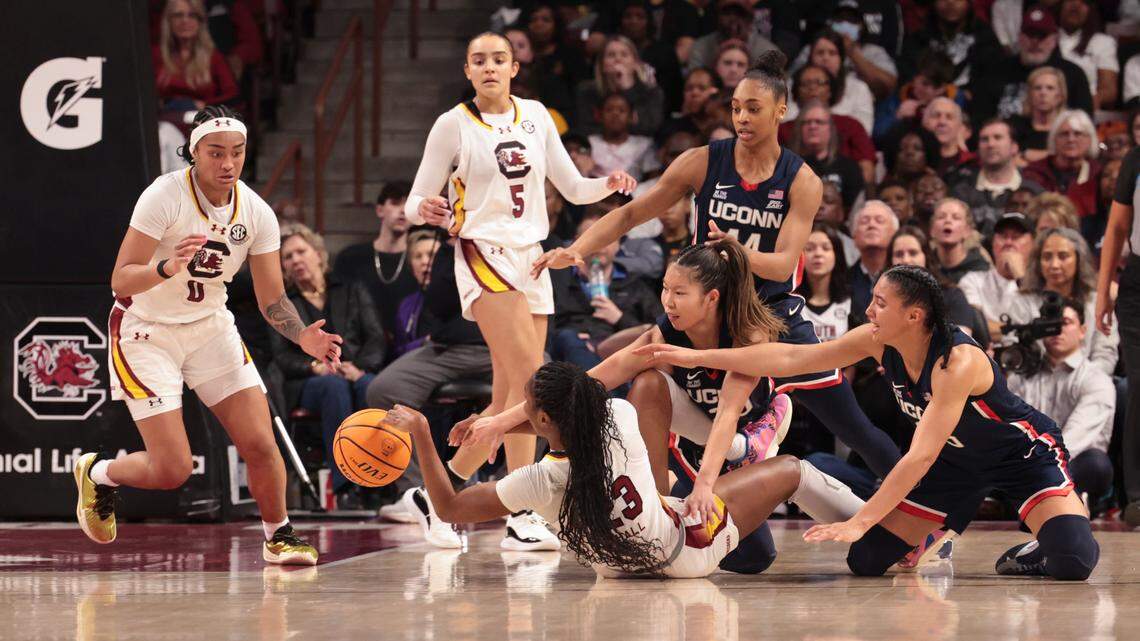 University of South Carolina’s Bree Hall (23) recovers a loose ball and pitches it to Te-Hina Paopao (0) during the first half of action in the Colonial Life Arena on Sunday, Feb. 16, 2025.