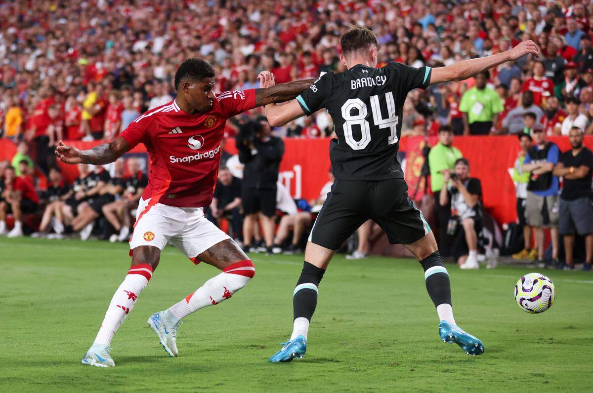 Liverpool defender Conor Bradley (84) and Manchester United forward Marcus Rashford (10) battle for the ball during the Rivals in Red International Friendly soccer match between Manchester United and Liverpool in Columbia on Saturday, August 3, 2024.
