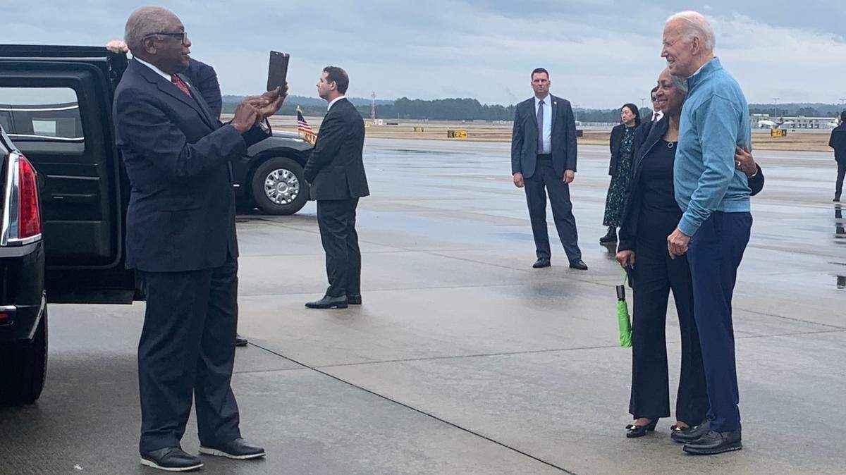 U.S. Rep. Jim Clyburn, D-Santee, takes a photo of Virginia Newman with President Joe Biden at Columbia Metropolitan Airport on Saturday, Jan. 27, 2024.