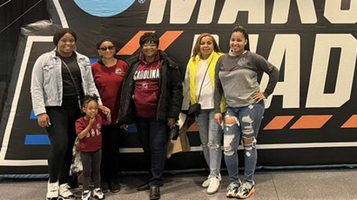 South Carolina FAMs, from left, Courtney Jackson, three-year-old Zoe Jackson, Patricia Hagood, Janice Livingston, Jameka Hagood and Jada Smalls attended the Gamecocks’ Elite Eight game against Creighton on Sunday, March 27, 2022, at the Greensboro Coliseum in Greensboro, N.C.