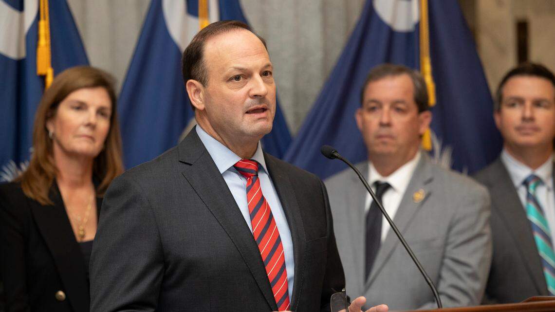 Attorney General Alan Wilson speaks about a human trafficking victim protection bill before a ceremonial bill signing in the lobby of the State House on Thursday, Aug. 15, 2024.