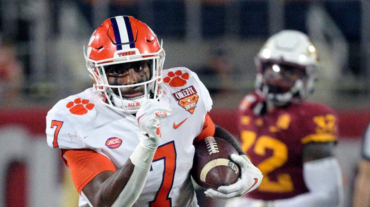 Clemson running back Kobe Pace (7) runs after catching a pass during the first half of the Cheez-It Bowl NCAA college football game against Iowa State, Wednesday, Dec. 29, 2021, in Orlando, Fla. (AP Photo/Phelan M. Ebenhack)