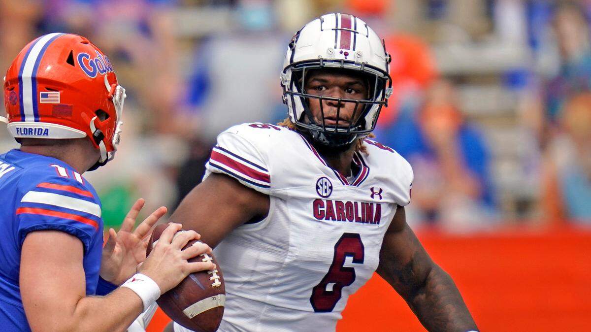 South Carolina defensive lineman Zacch Pickens (6) puts pressure on Florida quarterback Kyle Trask, left, as he looks for a receiver during the first half of an NCAA college football game, Saturday, Oct. 3, 2020, in Gainesville, Fla. (AP Photo/John Raoux, Pool)
