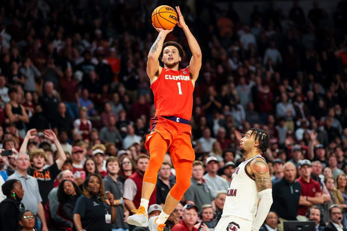 Clemson Tigers guard Chase Hunter (1) makes a three point basket with 0.3 seconds left in regulation to send the game to overtime in the second half of South Carolina’s 91-88 win at Colonial Life Arena.