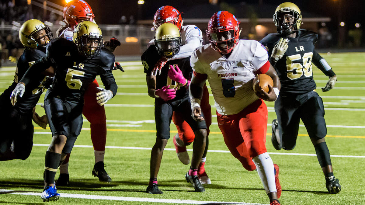 A.C. Flora Falcons Josh Heatly (5) scores a touchdown during the game between the AC Flora and Lower Richland at Lower Richland High School.