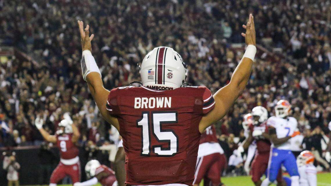 South Carolina quarterback Jason Brown (15) celebrates as South Carolina’s running back Juju McDowell (21) heads for the end zone as the Gamecocks take on Florida on Saturday, Nov, 6, 2021 at Williams-Brice Stadium.