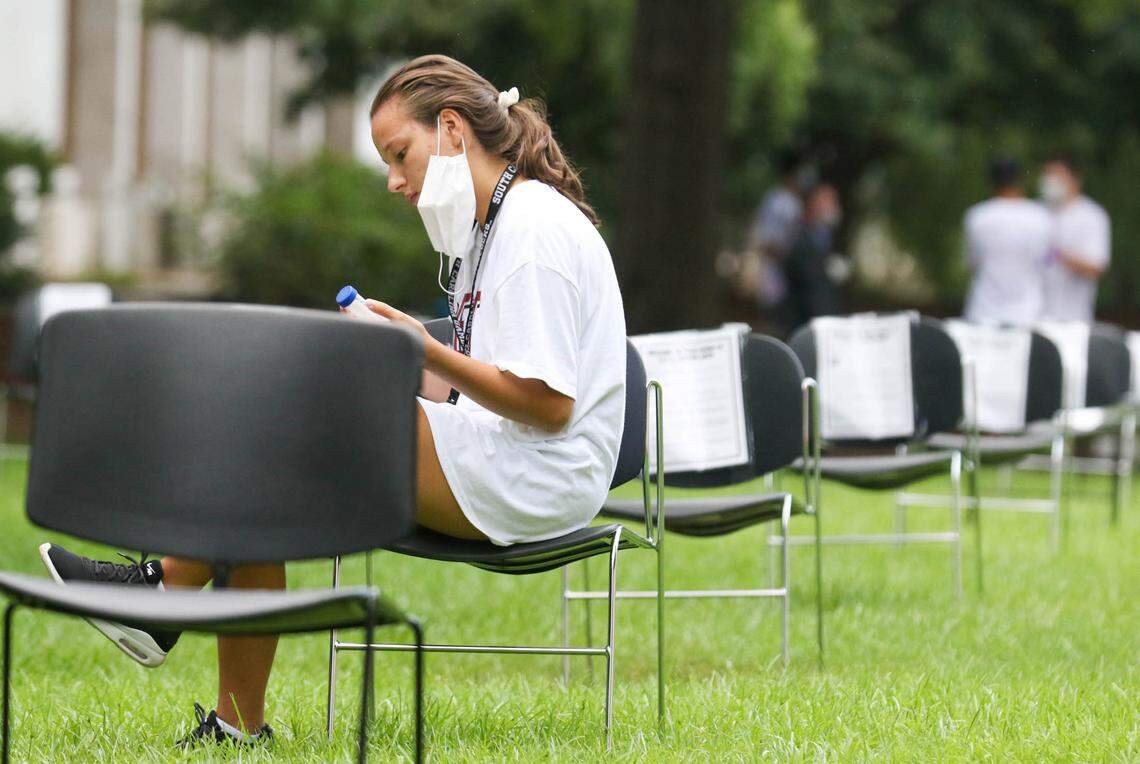 USC student Demetria Radgio prepares to take a saliva based COVID-19 test being administered on campus. The University of South Carolina is encouraging weekly tests to help control the spread of the coronavirus. Results from the test take less than 24 hours. 8/19/20