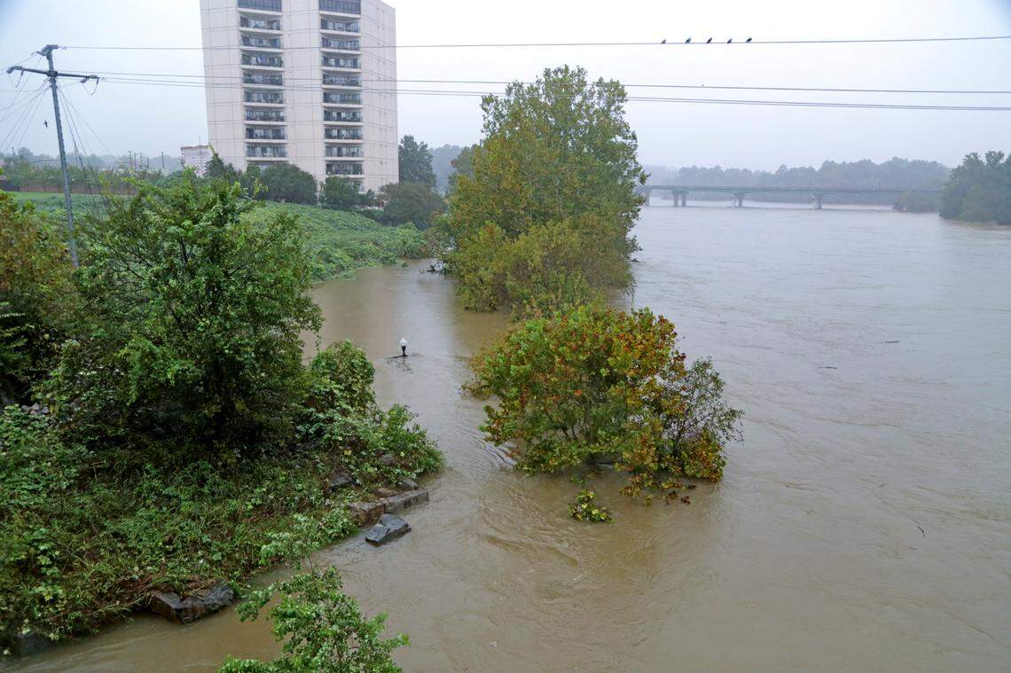 A lamp post is barely visible on what is the West Columbia Riverwalk along the Congaree River, on Monday, Oct. 5, 2015.
