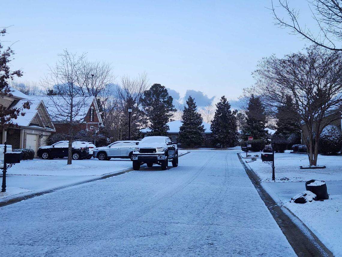 Snow blankets the Muirfield Place neighborhood in Lexington, SC on Jan. 22, 2025.