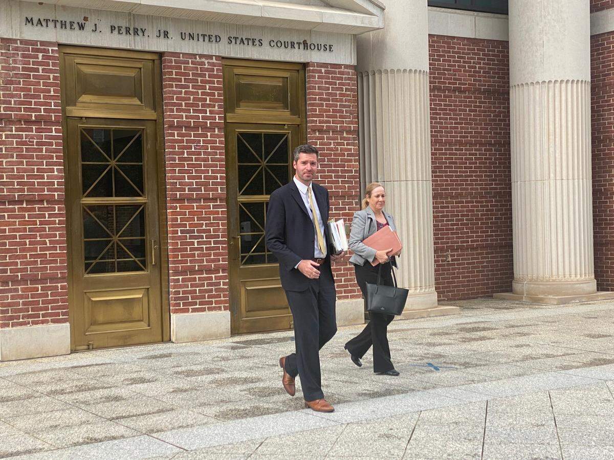 Federal prosecutors Ben Garner and Sandra Strippoli leave federal courthouse this week in Columbia after sentencing of former SEAL turned marijuana smuggler James Dennis “JD” Smith.