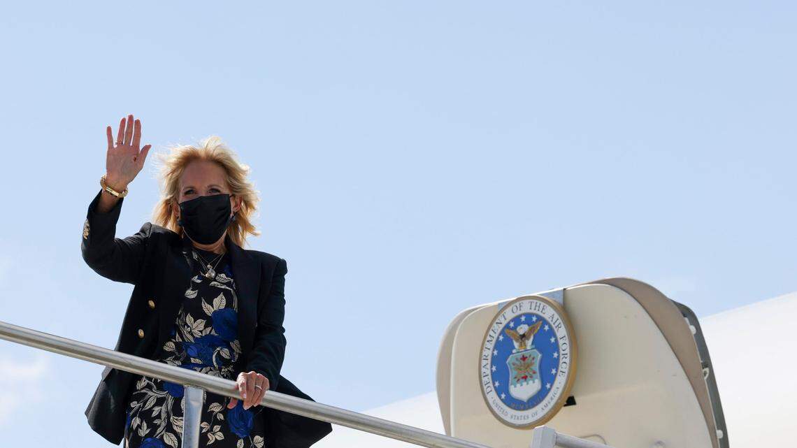 First lady Jill Biden waves before boarding a plane at General Mitchell International Airport in Milwaukee, Wis., Wednesday, Sept. 15, 2021. (Evelyn Hockstein/Pool via AP)