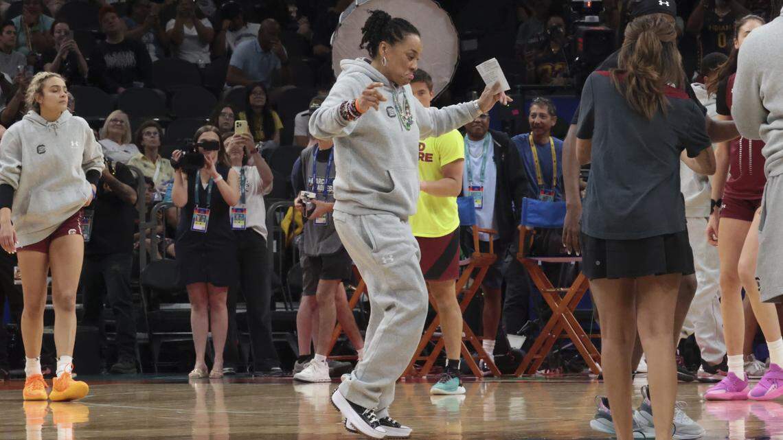 South Carolina's head coach Dawn Staley dances during practice at Mortgage Matchup Center in Phoenix on Saturday, April 4.