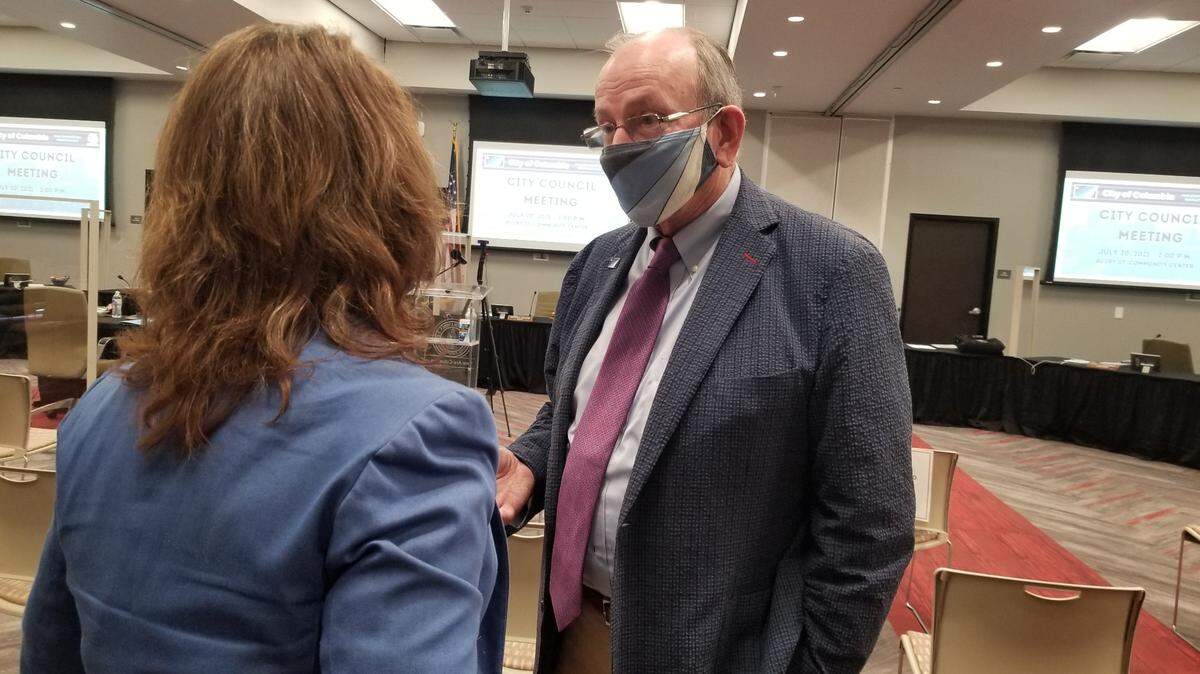 Columbia City Councilman Howard Duvall, right, talks to city budget director Missy Caughman on Tuesday, July 20, 2021.