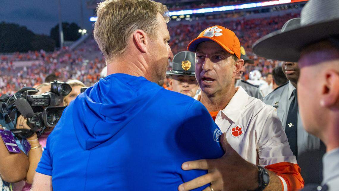 Clemson football and Dabo Swinney (right) have lost five straight home games to power conference teams for the first time since losing six straight across the 1970-71 seasons