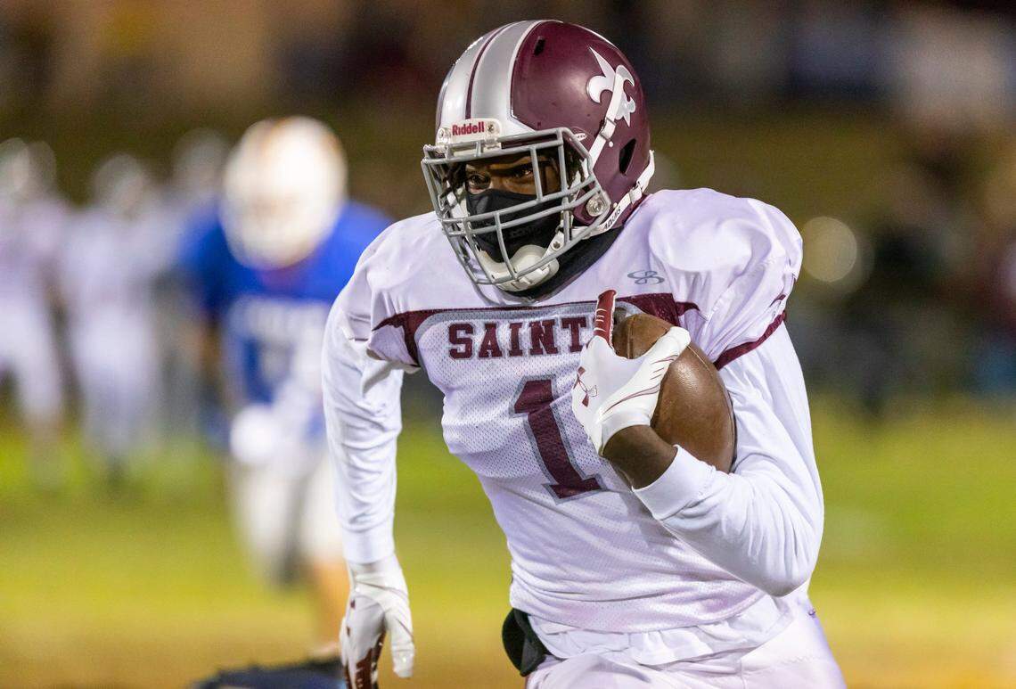 Kylic Horton of Clarendon Hall carries the ball during the Saints’ game against Richard Winn Academy on Friday, November 5, 2021.