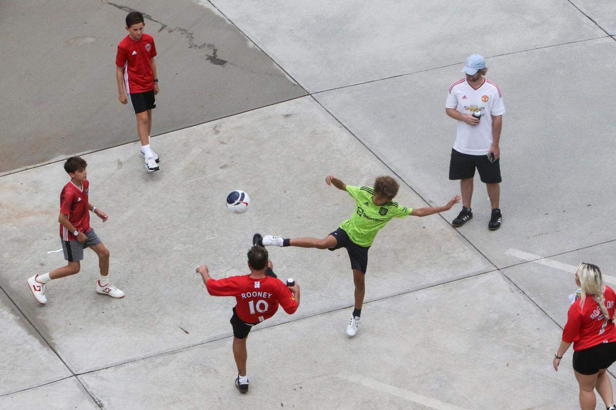 Soccer fans entertain themselves at Williams-Brice Stadium on Saturday, Aug. 3, 2024 in advance of the Premier League soccer matchup between Liverpool and Manchester United.