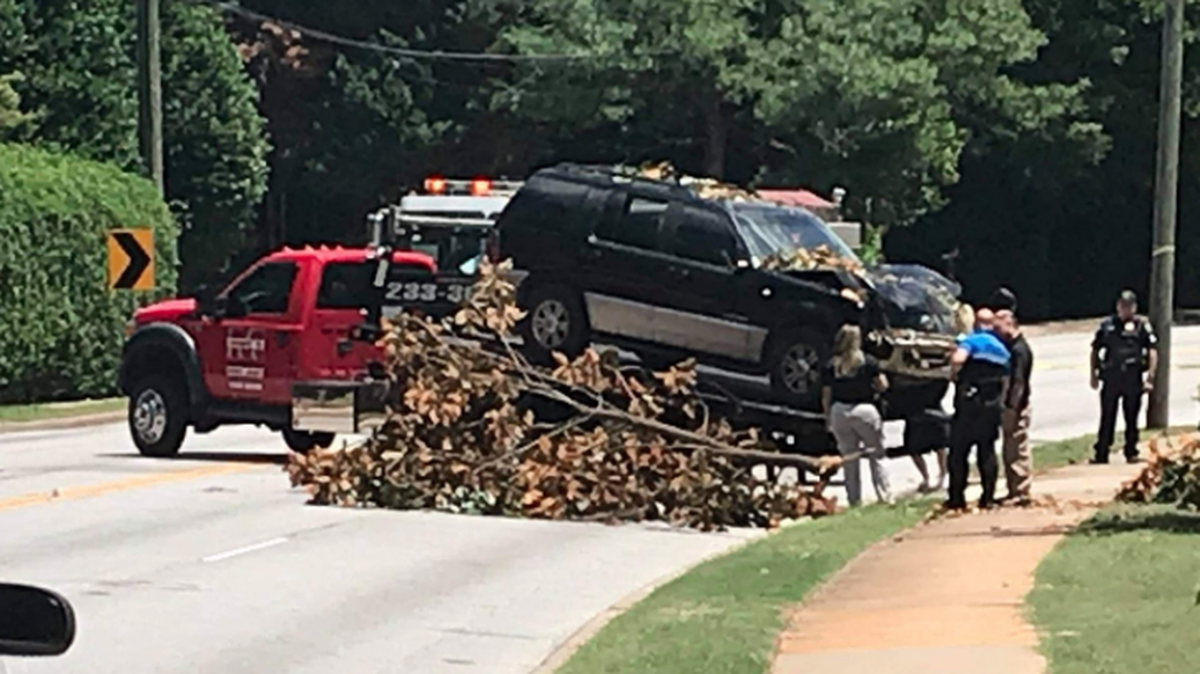 A suspect is in custody in the theft of an SUV that struck and killed a Greenville mother Saturday.