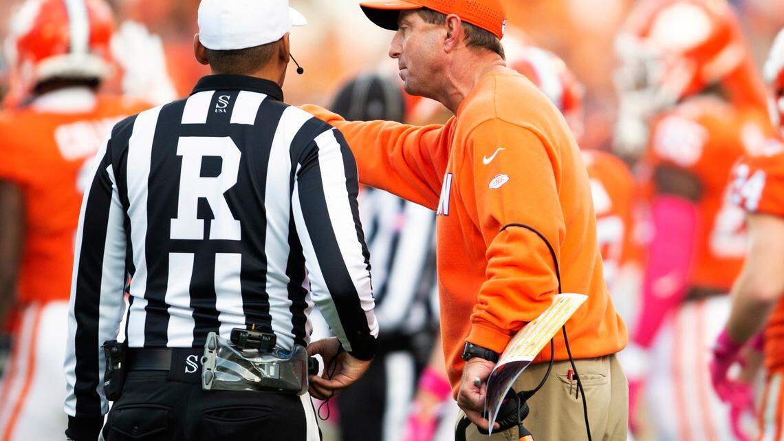 Clemson head coach Dabo Swinney yells at an official during the second half of an NCAA college football game against Florida State, Saturday, Oct. 30, 2021, in Clemson, S.C. (AP Photo/Hakim Wright Sr.)