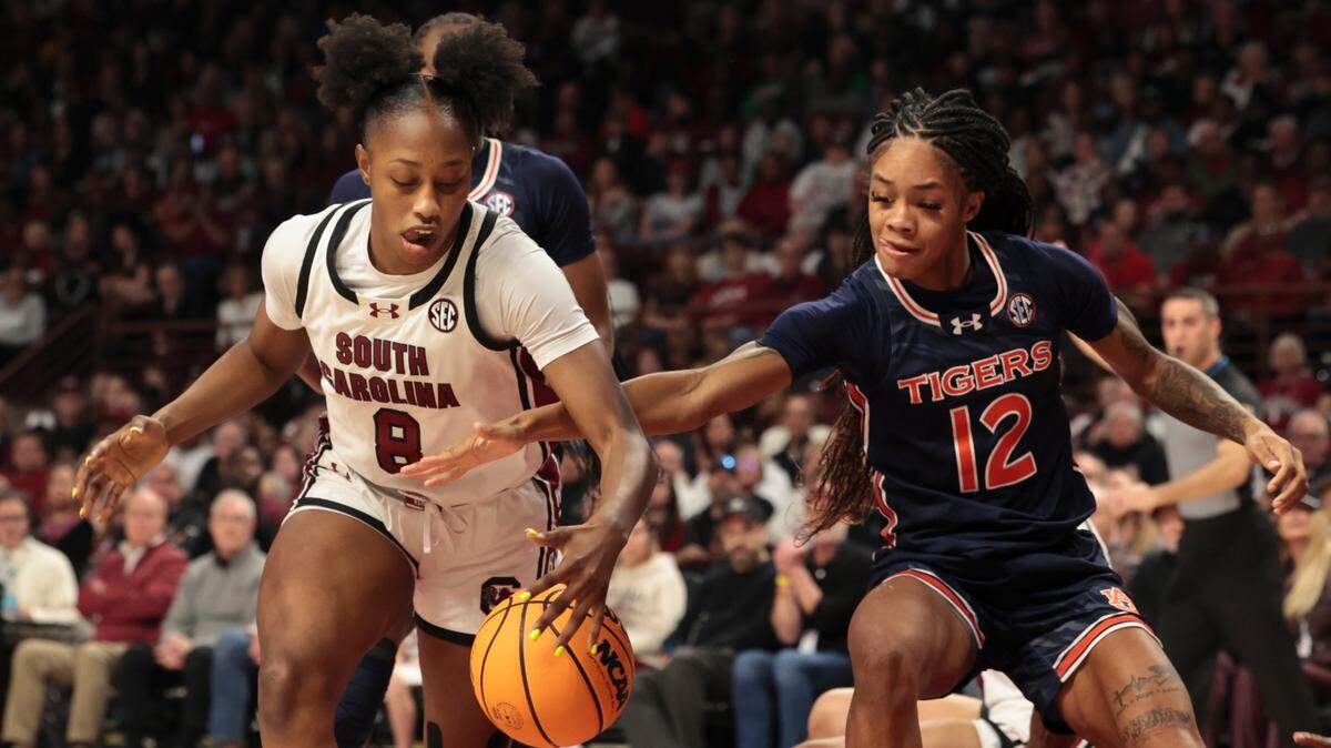 University of South Carolina’s  Joyce Edwards (8) snags the ball from Auburn’s Mar’shaun Bostic (12) during the second half of action in the Colonial Life Arena on Thursday, Jan. 9, 2025.