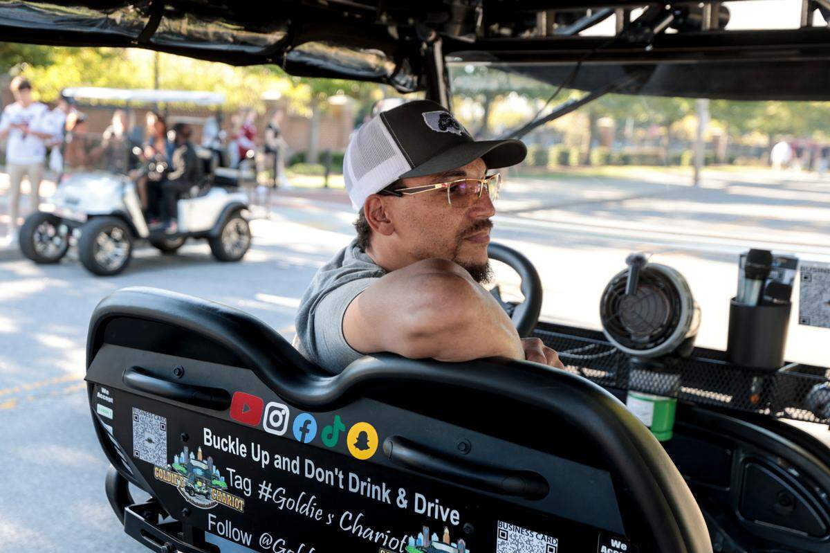 Chucky Hamilton spends gameday shuttling people around Williams-Brice Stadium before USC’s game against Missouri on Saturday, Nov. 16, 2024.