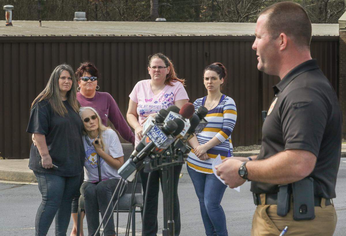 Friends and family members of 6-year-old Faye Swetlik attend a press conference conducted by Sgt. Evan Antley of the Cayce Department of Public Service.