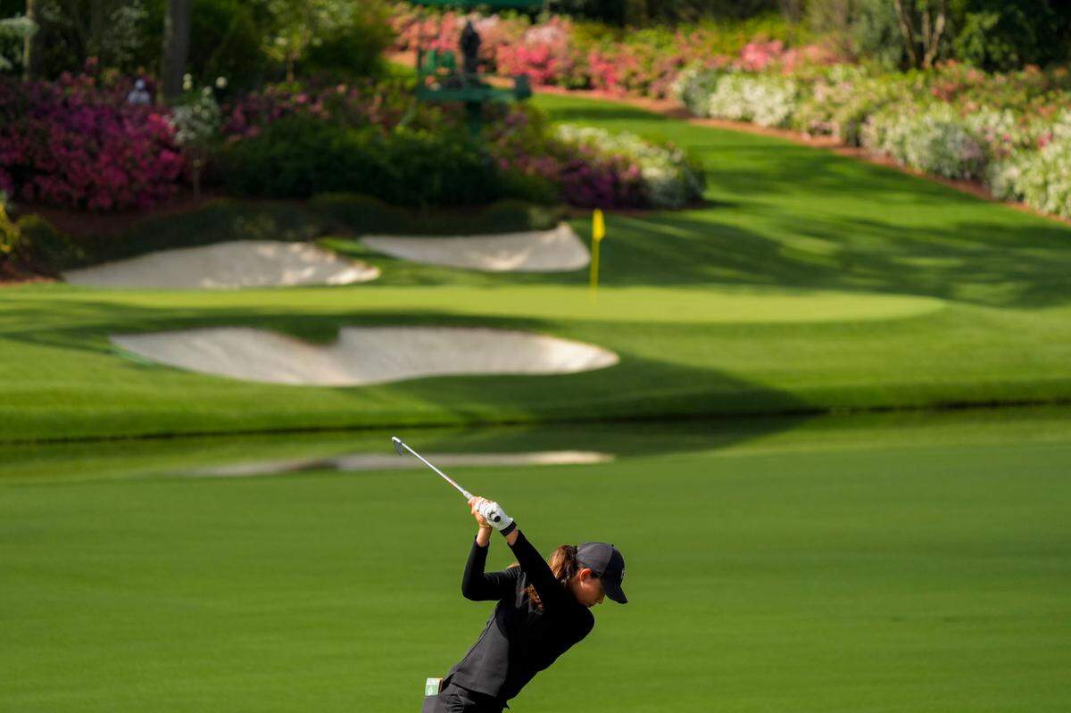 Eila Galitsky hits her tee shot on the 12th hole during the final round of the Augusta National Women’s Amateur golf tournament at Augusta National Golf Club.