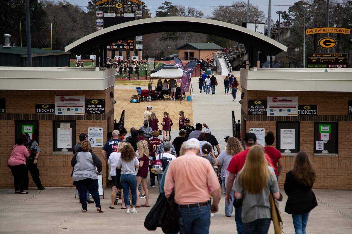 Fans enter J.W. Babb Stadium in Greenwood to watch Erskine College play Shorter University on Saturday, March 13, 2021.