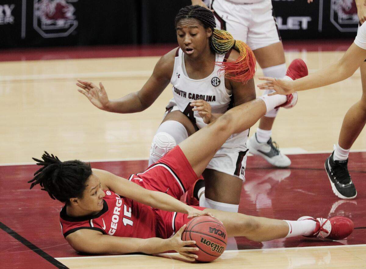 Georgia Lady Bulldogs center Maori Davenport (15) attempts to recover the ball at Colonial Life Arena on Thursday, January 21, 2021.