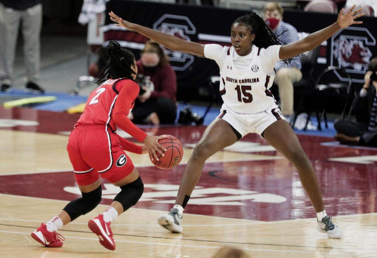 South Carolina Gamecocks forward Laeticia Amihere (15) blocks Georgia Lady Bulldogs guard Gabby Connally (2) at Colonial Life Arena on Thursday, January 21, 2021.