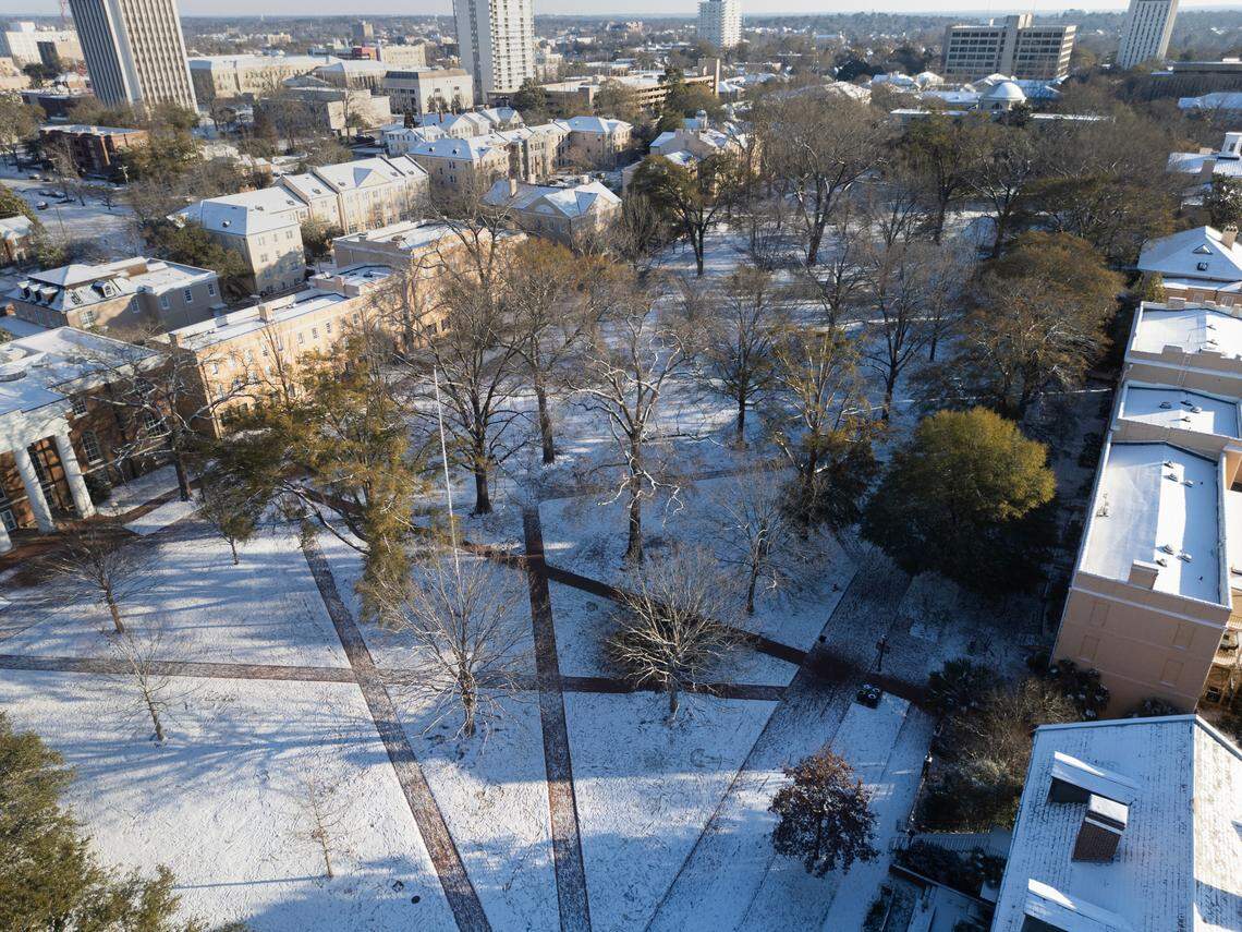 The University of South Carolina horseshoe in Columbia, South Carolina is covered in snow on Wednesday, January 22, 2025.