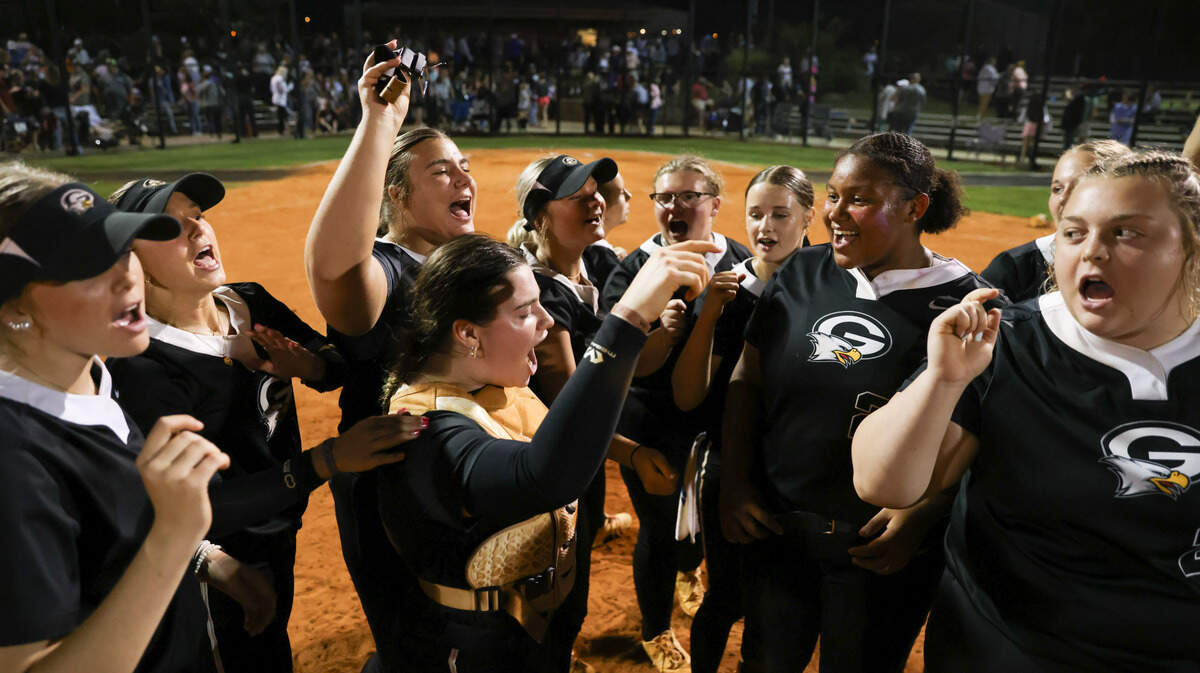Gray Collegiate players celebrate following Game 2 of the Class 4A softball championship between York and Gray Collegiate in York on Wednesday, May 28, 2025.