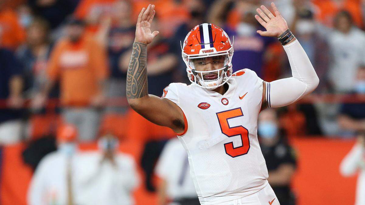 Clemson quarterback D.J. Uiagalelei (5) celebrates after a touchdown run by running back Kobe Pace against Syracues during the second quarter of an NCAA football game in Syracuse, N.Y., Friday, Oct. 15, 2021. (AP Photo/Joshua Bessex)