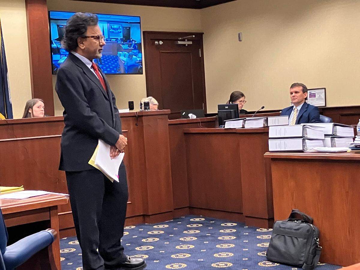 Isle of Palms beach house owner Rom Reddy questions former state regulator Matt Slagel during an administrative law court hearing May 6, 2025, over construction of what state regulators say was an illegal seawall at Reddy’s home. Reddy says the wall was legal and was making his case before the court, with out lawyers. 