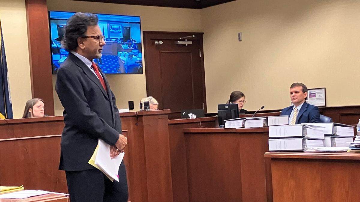 Isle of Palms beach house owner Rom Reddy questions former state regulator Matt Slagel during an administrative law court hearing May 6, 2025 over construction of what state regulators say was an illegal seawall at Reddy’s home. Reddy says the wall was legal and was making his case before the court, with out lawyers.