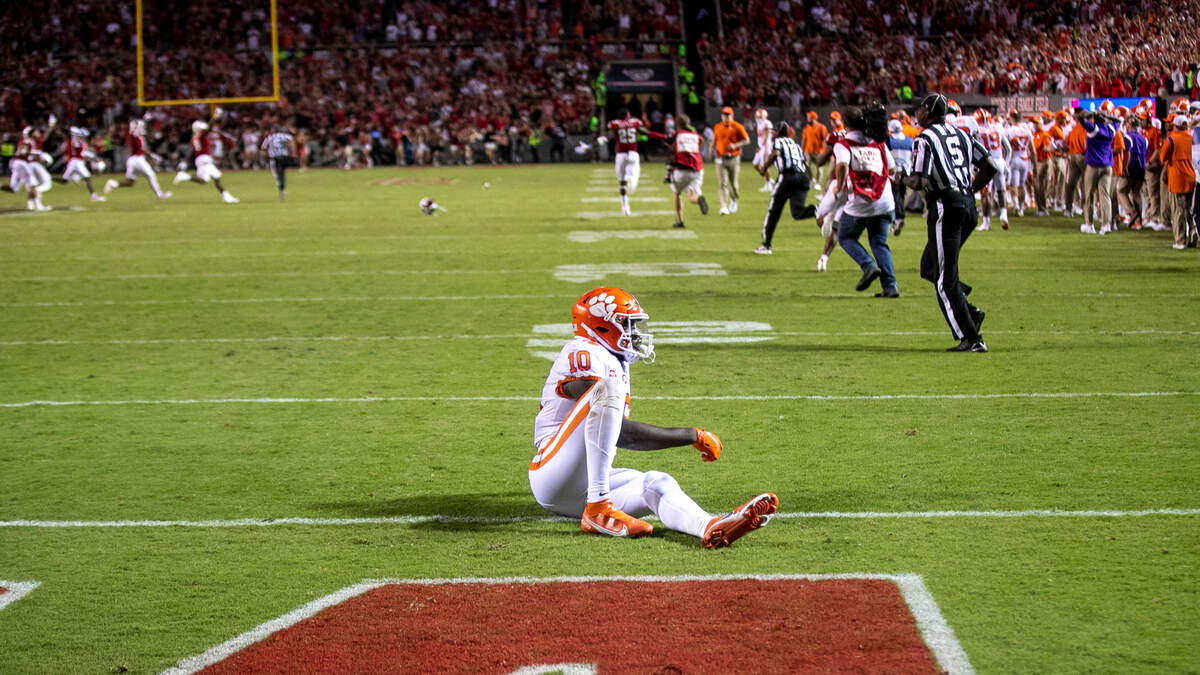 Clemson wide receiver Joseph Ngata (10) drops to the turf after the Clemson offense failed to score in the second overtime giving N.C. State a 27-21 victory on Saturday September 25, 2021 at Carter-Finley Stadium in Raleigh, N.C.